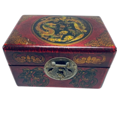Chinese box depicting dragon and phoenix with brass closure