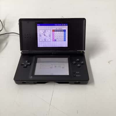 Nintendo DS lite  with charger cable /plug - no stylus -working 