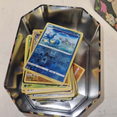 15 Pokemon books and Pokemon collectors Cards
