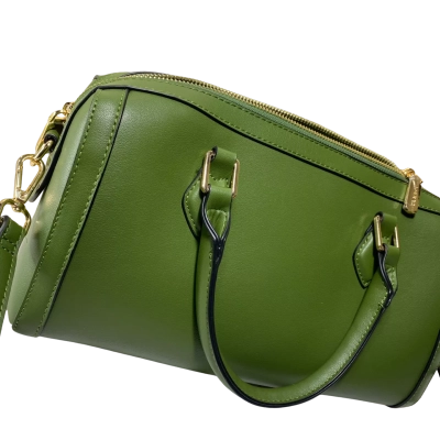 olive green barrel-style duffle crossbody handbag from the Australian fashion label Marcs. It is constructed with dual rolled top handles, a detachable shoulder strap, a top zip closure, and polished gold-toned hardware 30c18x12 cm