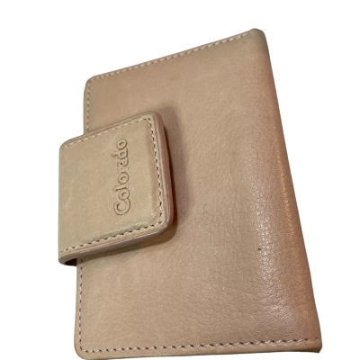 Colorado leather wallet features a beige finish and a secure snap-button closure