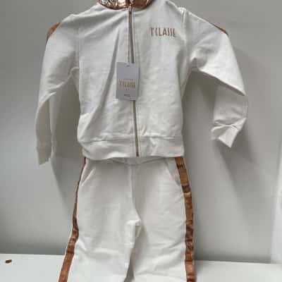 Tilasse Kids tracksuit world map Size 4 Cream / Gold 