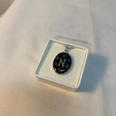  Womens. Opal “N” necklace with 18k plated white gold chain