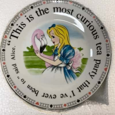 Alice in Wonderland saucers set of 4 designed by Paul Cardew