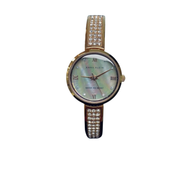  Womens Anna Klein Goldtone Watch with shell face and White stones in the  band 