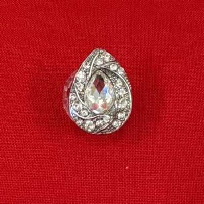  Women's Silver Tone Costume Ring with a Large Central Stone surrounded by Smaller Stones