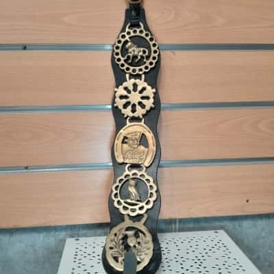 Horse harness brass medallions on leather belt