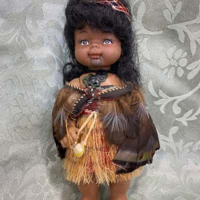 Vintage Māori doll in traditional dress