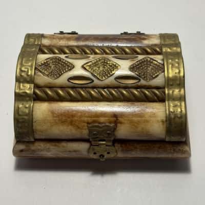 Handcrafted Bone Trinket Box featuring intricate brass inlay 