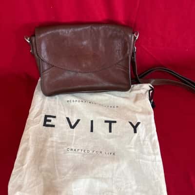 Women’s Evity Brown Leather Cross Body Bag featuring Flap Closure & Back Zipper Pocket