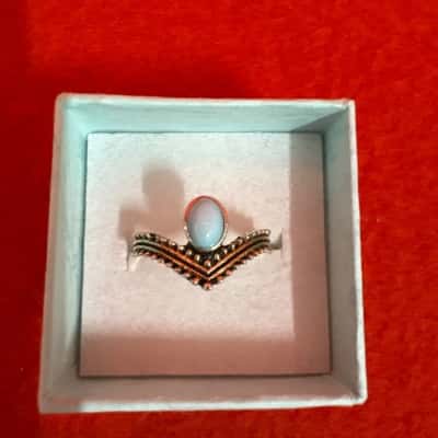  Women's Silver tone bohemian-Style Ring featuring a Small Light Blue Gemstone set in a Chevron-Shaped Band