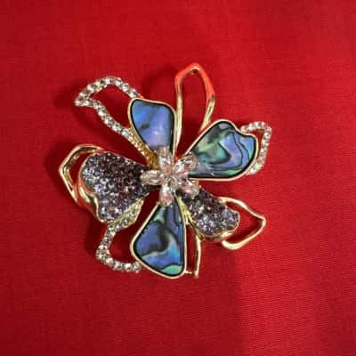  Women's Gold Tone Flower Brooch featuring Purple Rhinestones
