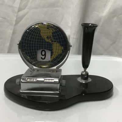 Vintage chrome and black globe desk calendar with pen holder
