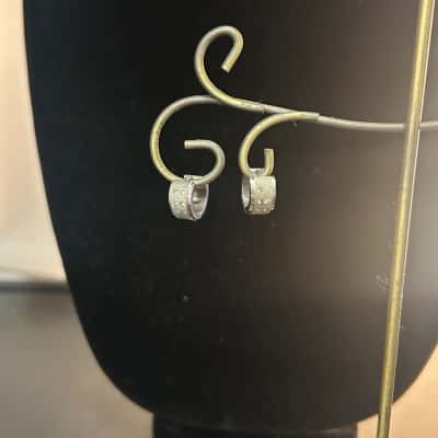 Silver tone earrings with clear stones 