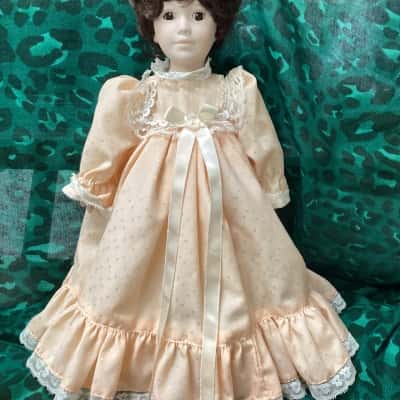 Porcelain Doll on Stand