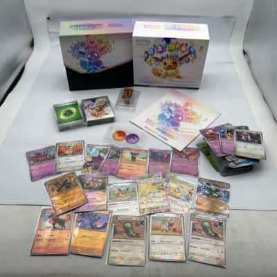 Opened Pokémon Prismatic Evolutions Pokémon Center Elite Trainer Box, Cards & Accessories 