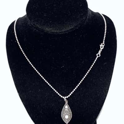 Marked 925 Italy both Necklace and Pendant with some White stones 