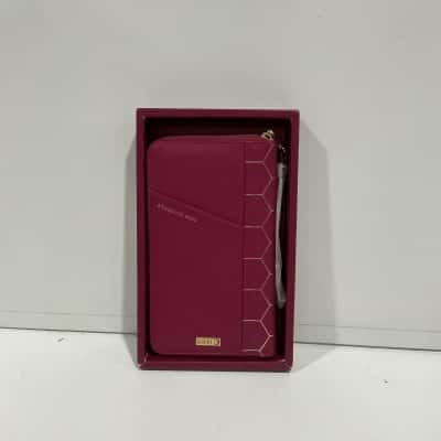 Kikki.K Textured leather zip travel wallet 