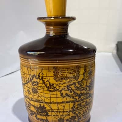 Beautiful old decanter with an old map version print 