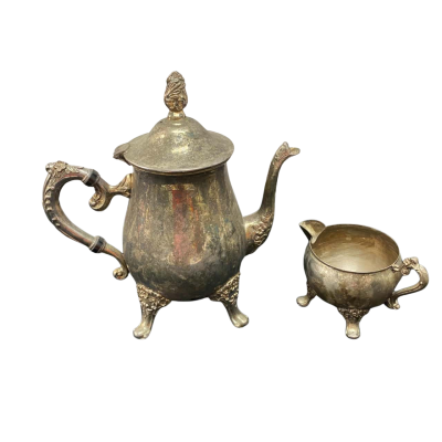 Silver teapot and jug