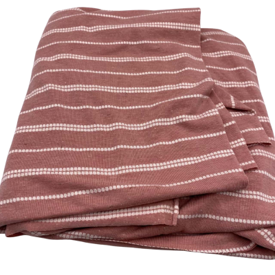 Stretch cotton mix fabric.  160 (w) x 98 (L) cm approx.  Rose pinks with dotted stripes.