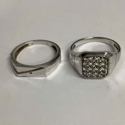 2 Sterling Silver Rings with Cubic Zirconia Size X & T