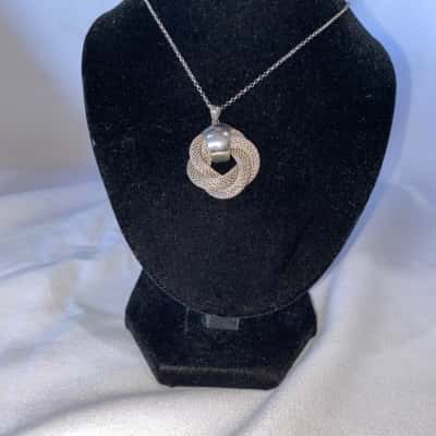 925 MARKED SILVER NECKLACE AND TWISTED MESH LIKE SILVER PENDANT 