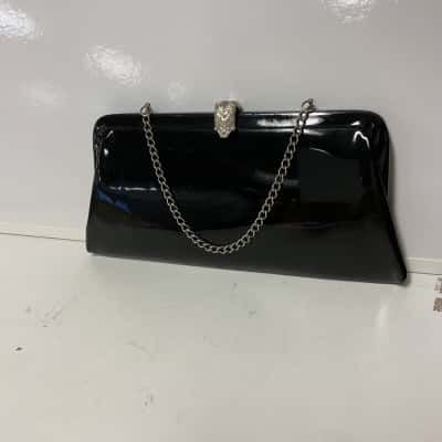  Womens Clutch Black vinyl with silver coloured chain and clasp  