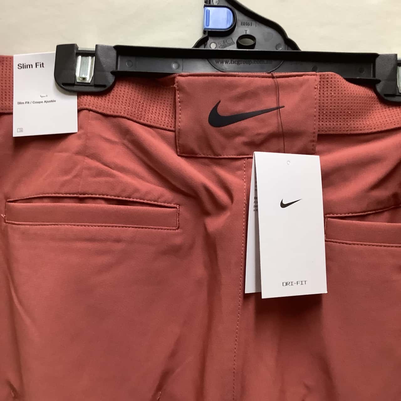 red nike golf pants