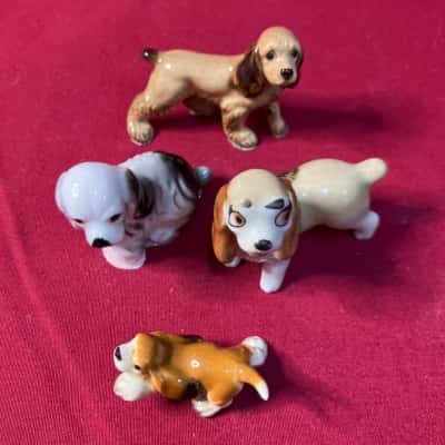 Set of 4 Porcelain Dogs Mini Figures. 1- Wade Disney Lady & the Tramp, 2 - Hagen Renaker, 3 - Cocker Spaniel, 4- Beagle