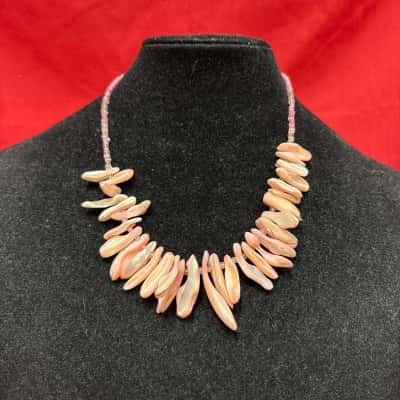 Ladies Statement Necklace Featuring pink and white shell chips 