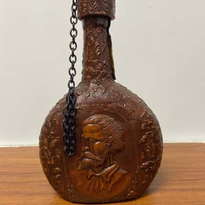 Vintage leather wrapped decanter 