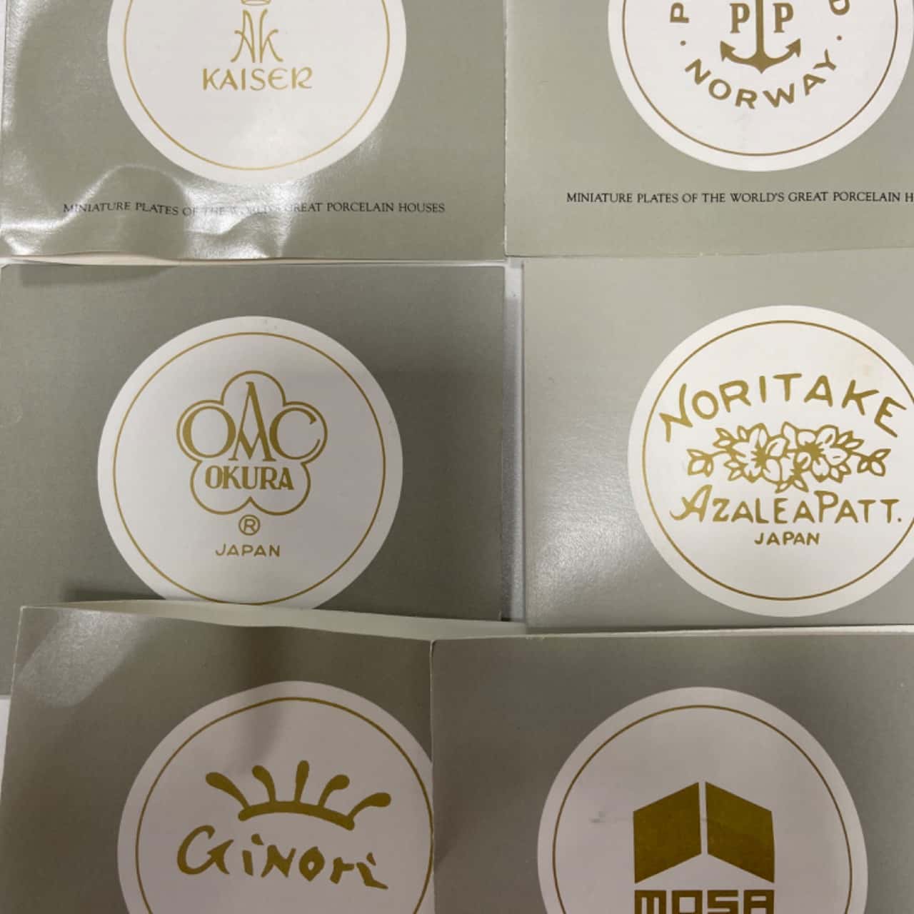 24 miniature plates of the worlds great porcelain houses(s)