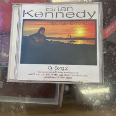 Brian Kennedy red sails in the sunset