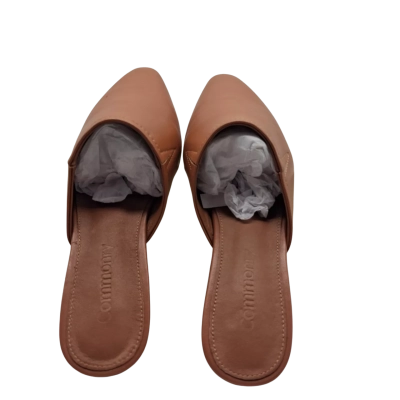 A pair of Brand new in box Womens Commonry slide on flat shoes