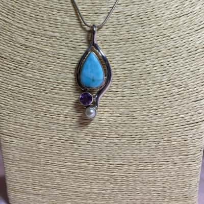 925 SILVER CHAIN AND PENDANT WITH BLUE AND PURPLE STONES, AND A PEARL LIKE STONE 