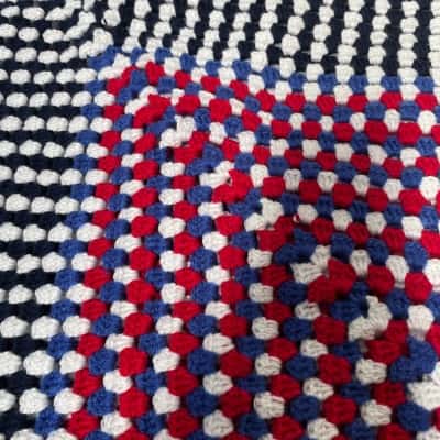 Crochet Throw acrylic. 117 x 134 cms. Navy/White/Blue/Red