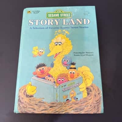 Vintage hardcover children's book Sesame Street Story Land, published by Golden Books. This collection features fourteen different stories with the familiar Sesame Street characters. Published in June 28,1986.  (B4)