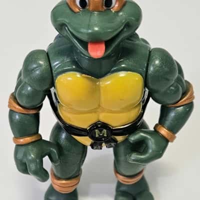 Vintage 1992 TMNT Michelangelo Playmates Figurine with Accessories.