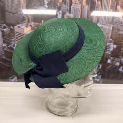 Sandra Rogers. Green & Navy Straw Hat.    