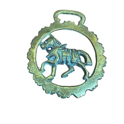 Vintage horse brass . Cantering horse 