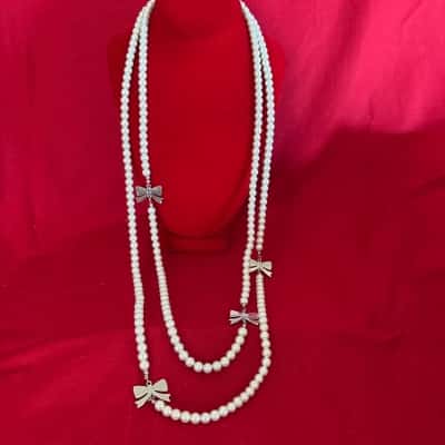  Women's Faux Pearl Long Necklace featuring Silver Tone Bow Accents 