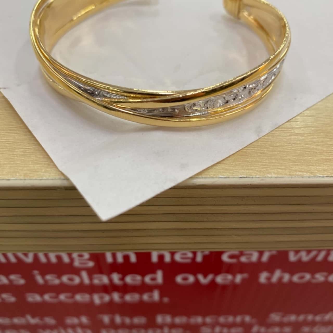 Women’s gold bangle(s)