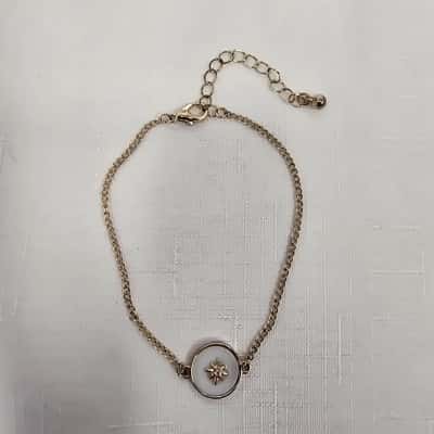  Women's Gold Tone White Enamel Medallion featuring a Star Detail Bracelet 