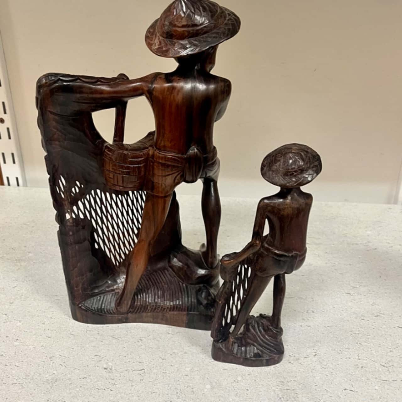 Handcrafted Vietnamese fishing man statue x 2 28cm high & 19cm(s)