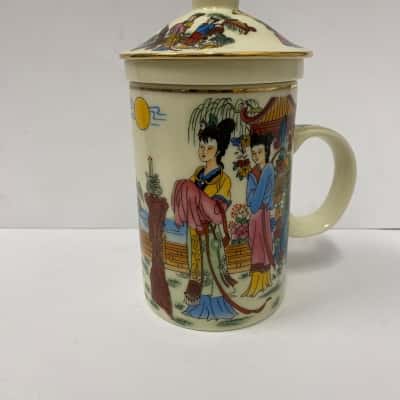 Ceramic tea infuser mug with lid