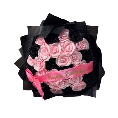 Bouquet of glitter black and pink flowers 