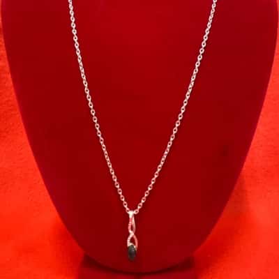  Women's Silver Tone Necklace featuring an Infinity - style Pendant Set with a Dark Gemstone
