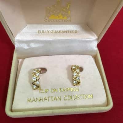  Women's Manhattan Collection Gold Tone Clip On Earrings featuring a Geometric Design Set with Clear Stones