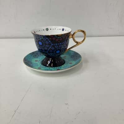 T2 footed cup and saucer 